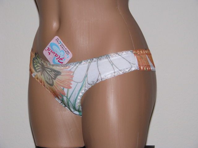 Side view showing butterflies and flowers.